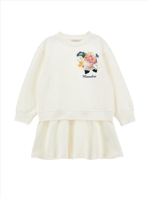 Vestito in felpa da bambina decorato con toppe a fiori.