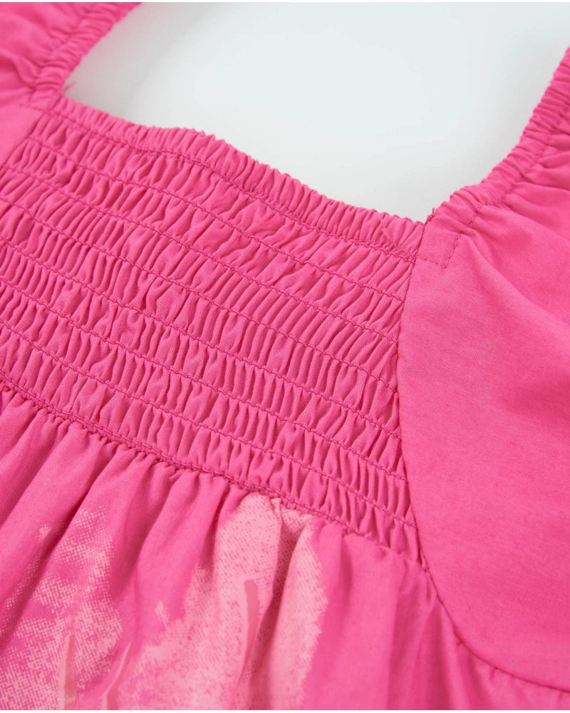 Girl's plain weave dress with shirred bodice