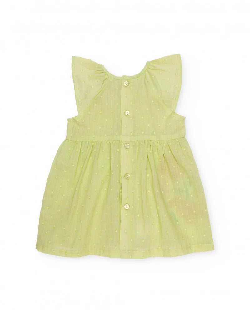 Baby dress in textured polka dot fabric
