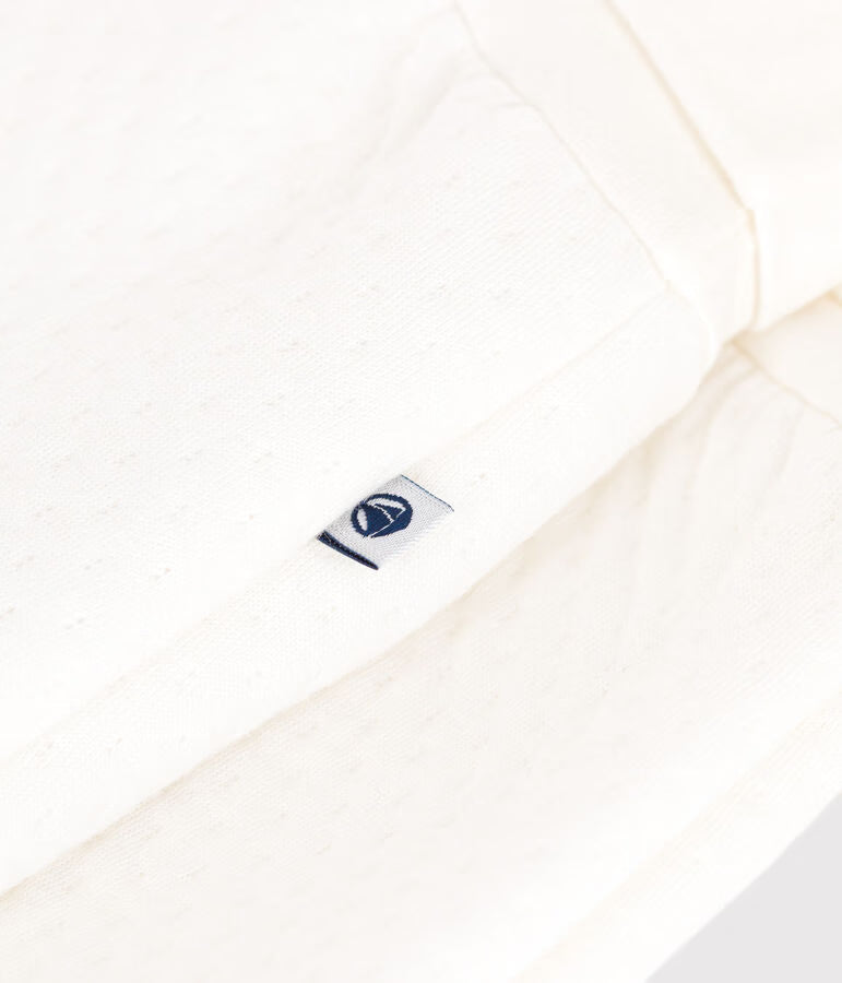 Pantaloni con piedini in tubique trapuntato neonato