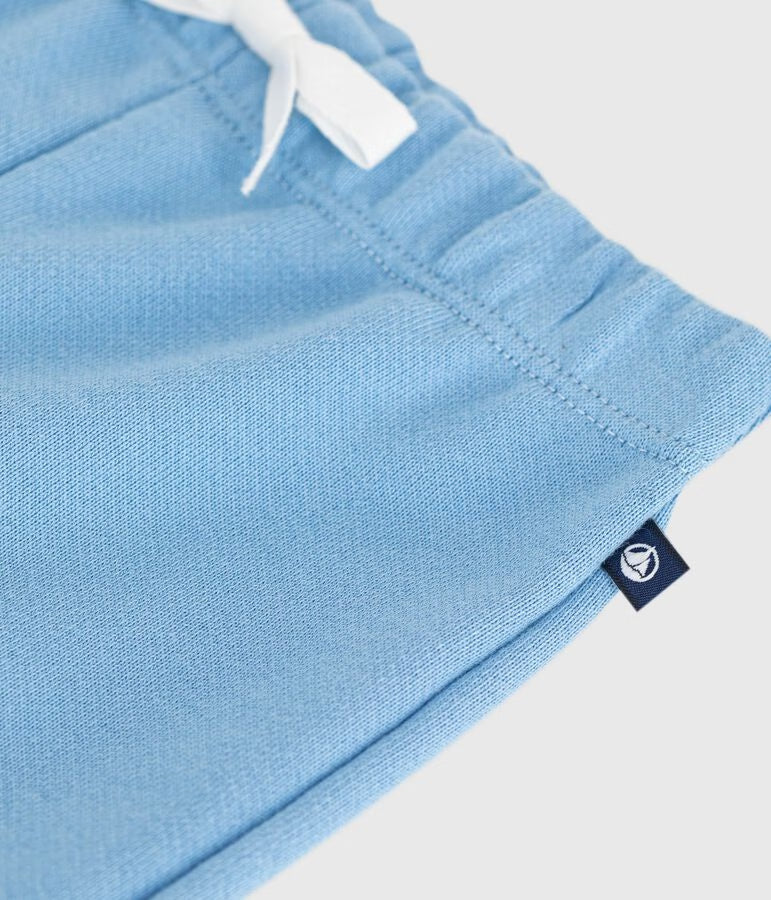 Joggers in cotone tinta unita neonato