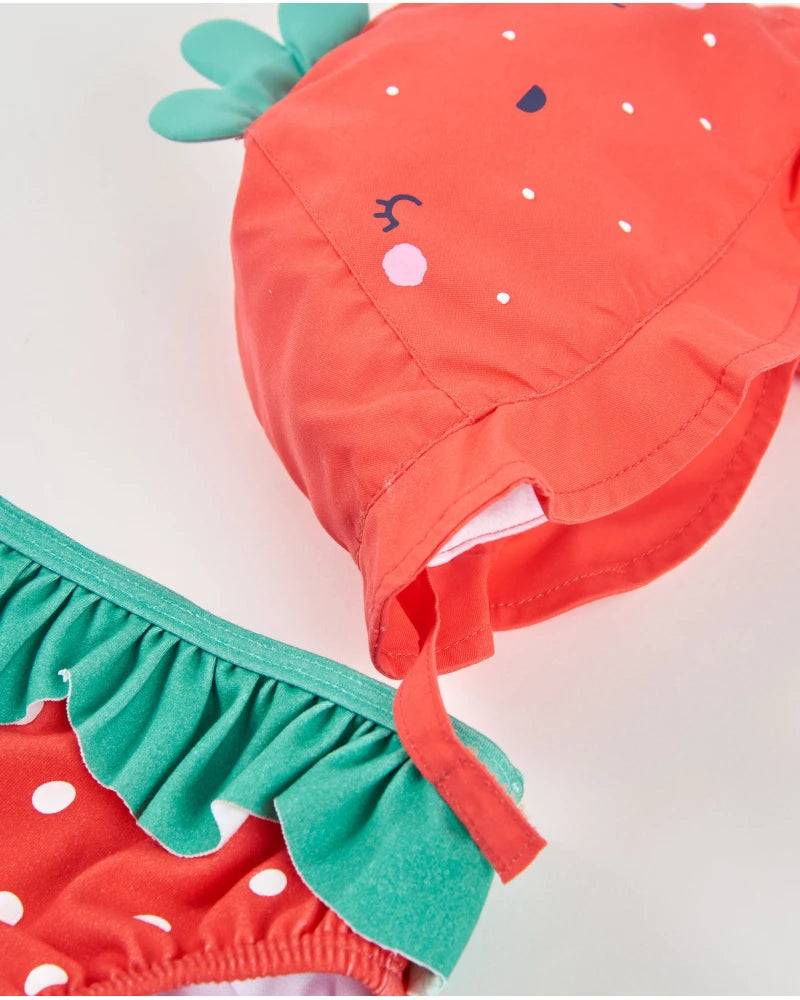 Baby swimsuit in fabric with strawberry pattern