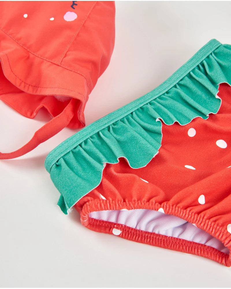 Baby swimsuit in fabric with strawberry pattern