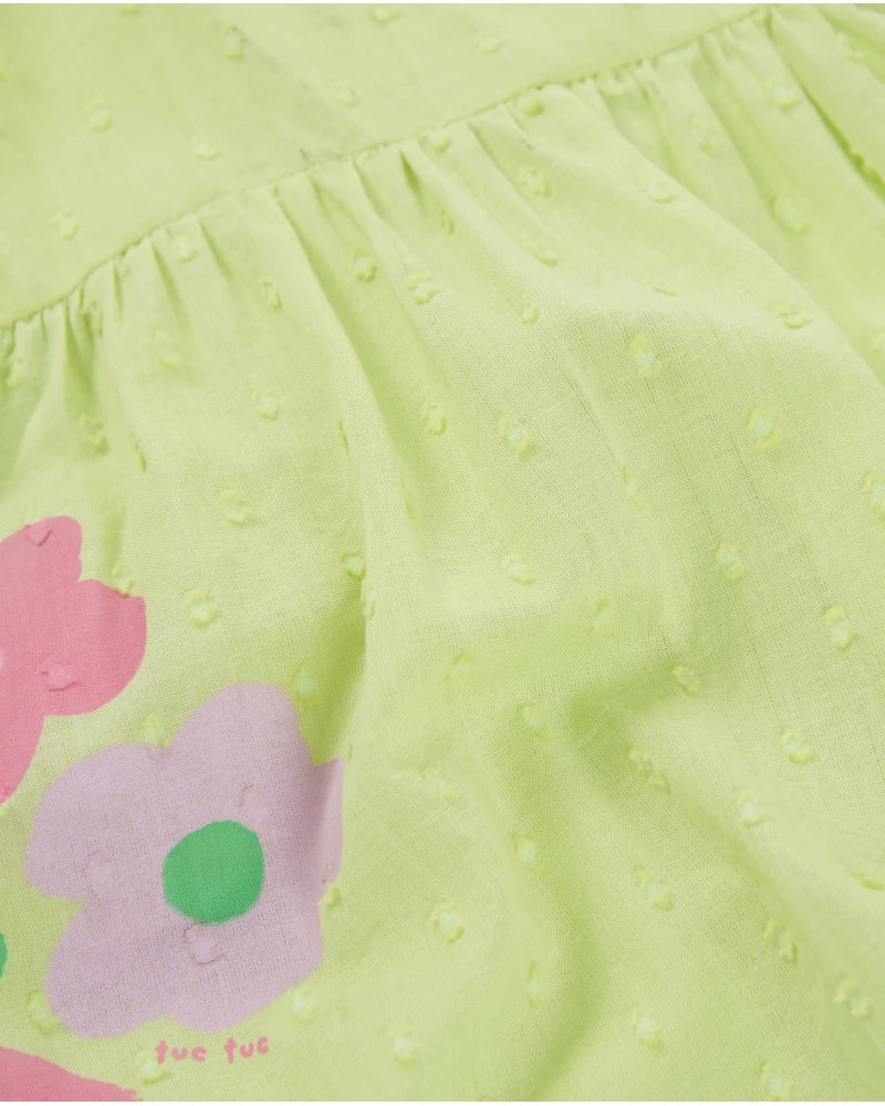 Baby dress in textured polka dot fabric